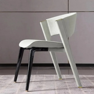 Atara Dining Chair with Black Powder Coated Metal Legs.