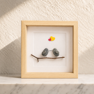 Two Hearts, One Perch – Handcrafted Natural Pebble Art Frame