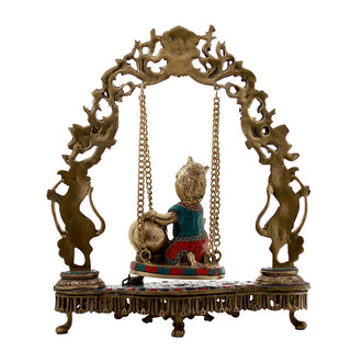 Lord Krishna Sitting on Swing Statue Made of Pure Brass - 16 x 5 x 18 Inch, 7 Kg